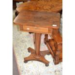 A small early Victorian rosewood pedestal table with tapering column, platform base and turned bun