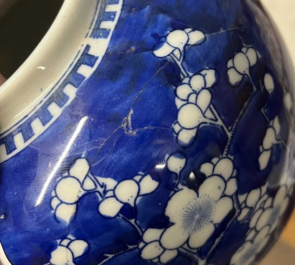 A Chinese porcelain ginger jar 19th Century, the blue ground with prunus decoration, four - Image 11 of 11