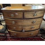 A late Georgian mahogany bow front five drawer chest with oval handles and outswept legs, 107cm