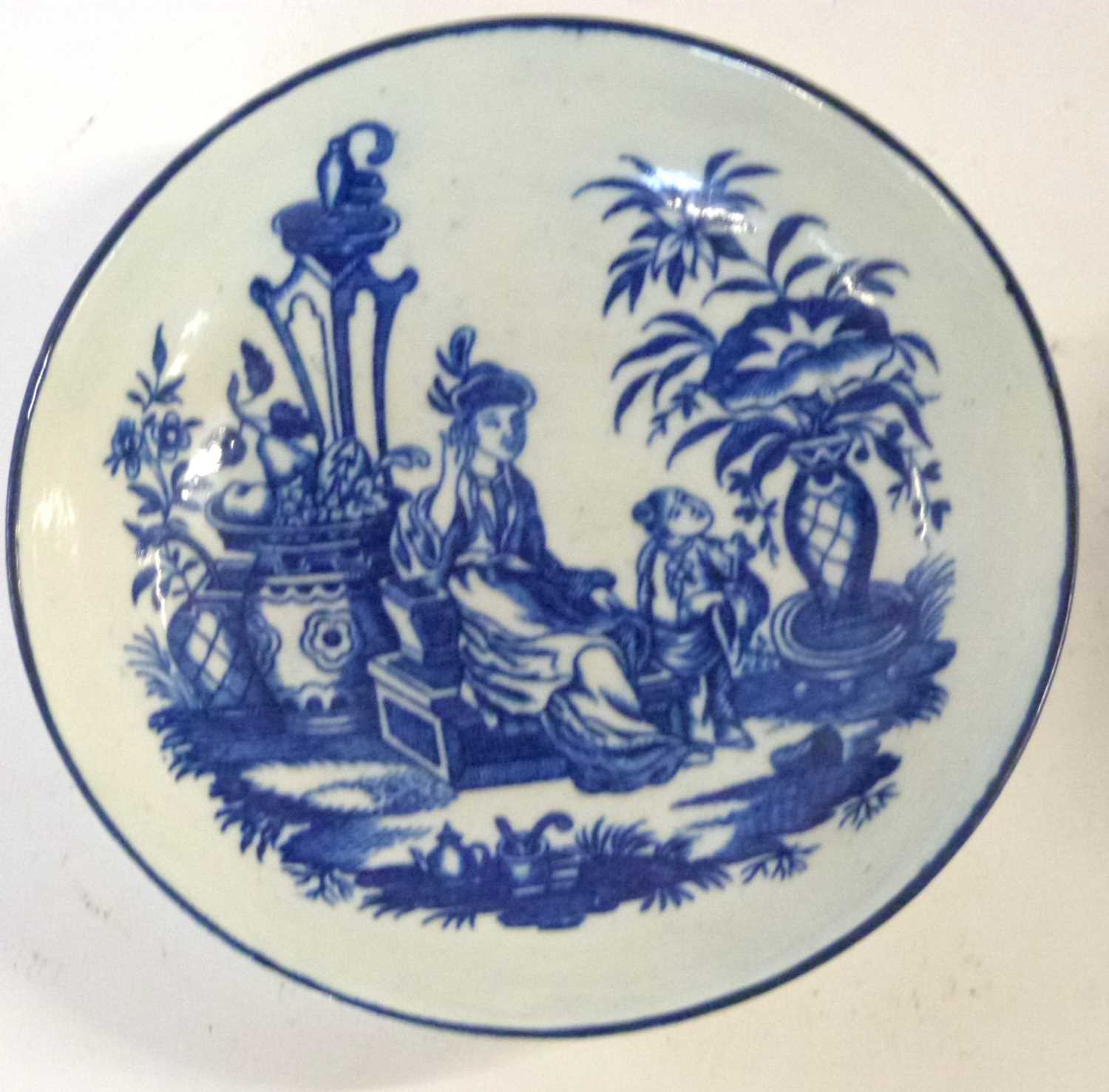 An 18th Century Worcester porcelain tea bowl and saucer decorated in underglaze blue with the mother - Image 2 of 4