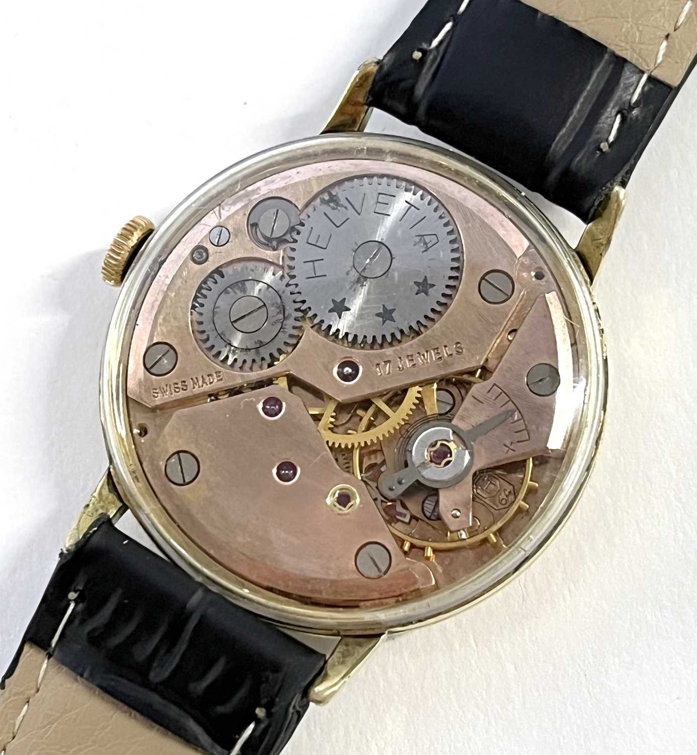 A 1960's Swiss Helvetia gentleman's skeleton-back wristwatch, with arrow hands and baton markers, - Image 6 of 6