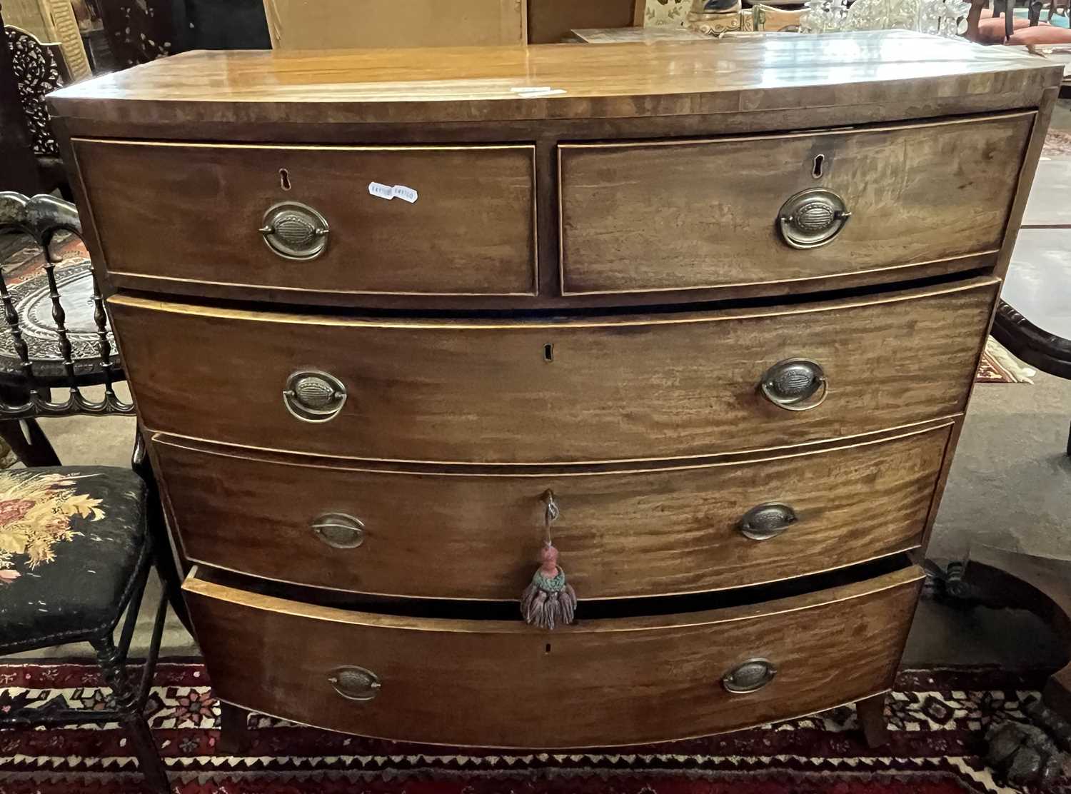 A late Georgian mahogany bow front five drawer chest with oval handles and outswept legs, 107cm - Image 2 of 2