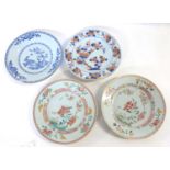 Group of four 18th Century Chinese export plates, two with blue and white designs and two famille