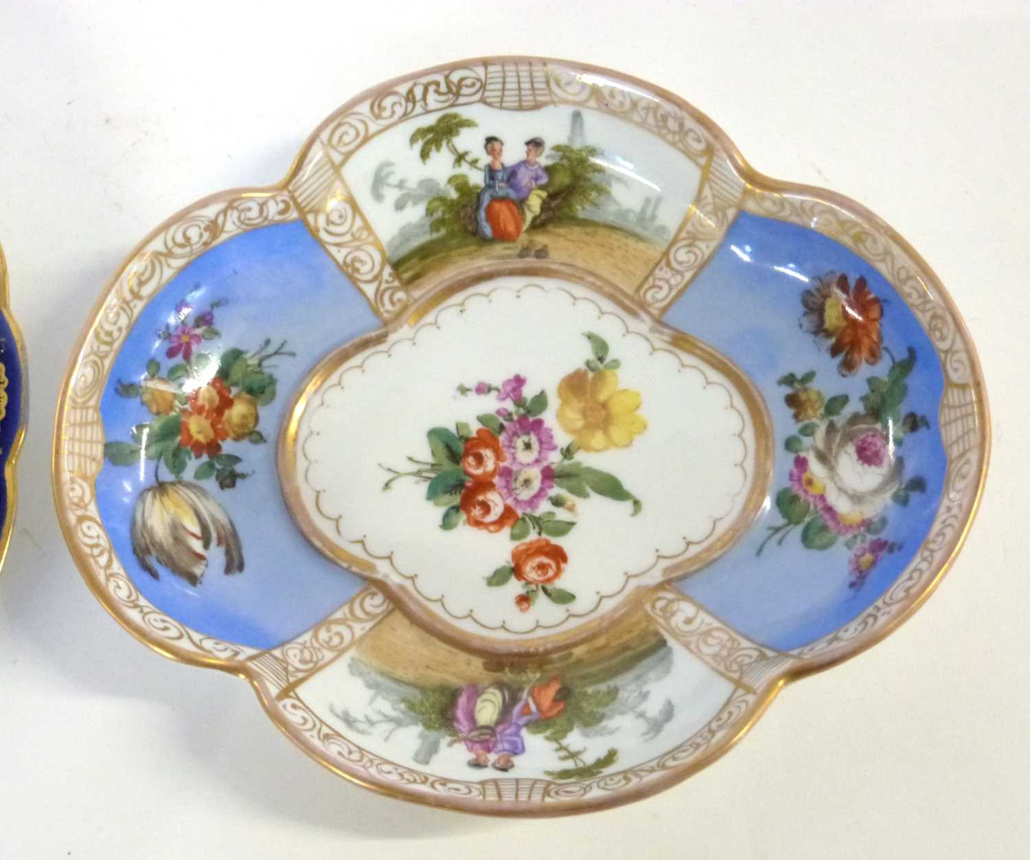 A 19th Century continental porcelain lobed dish decorated in Meissen style with blue AR mark to base - Image 3 of 4