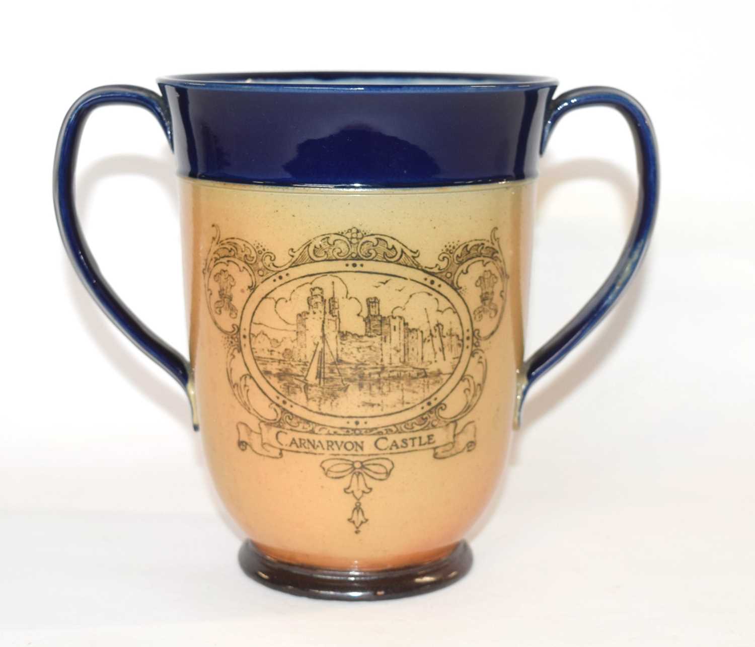 A Royal Doulton loving cup commemorating the investiture of the Prince of Wales at Carnarvon Castle,