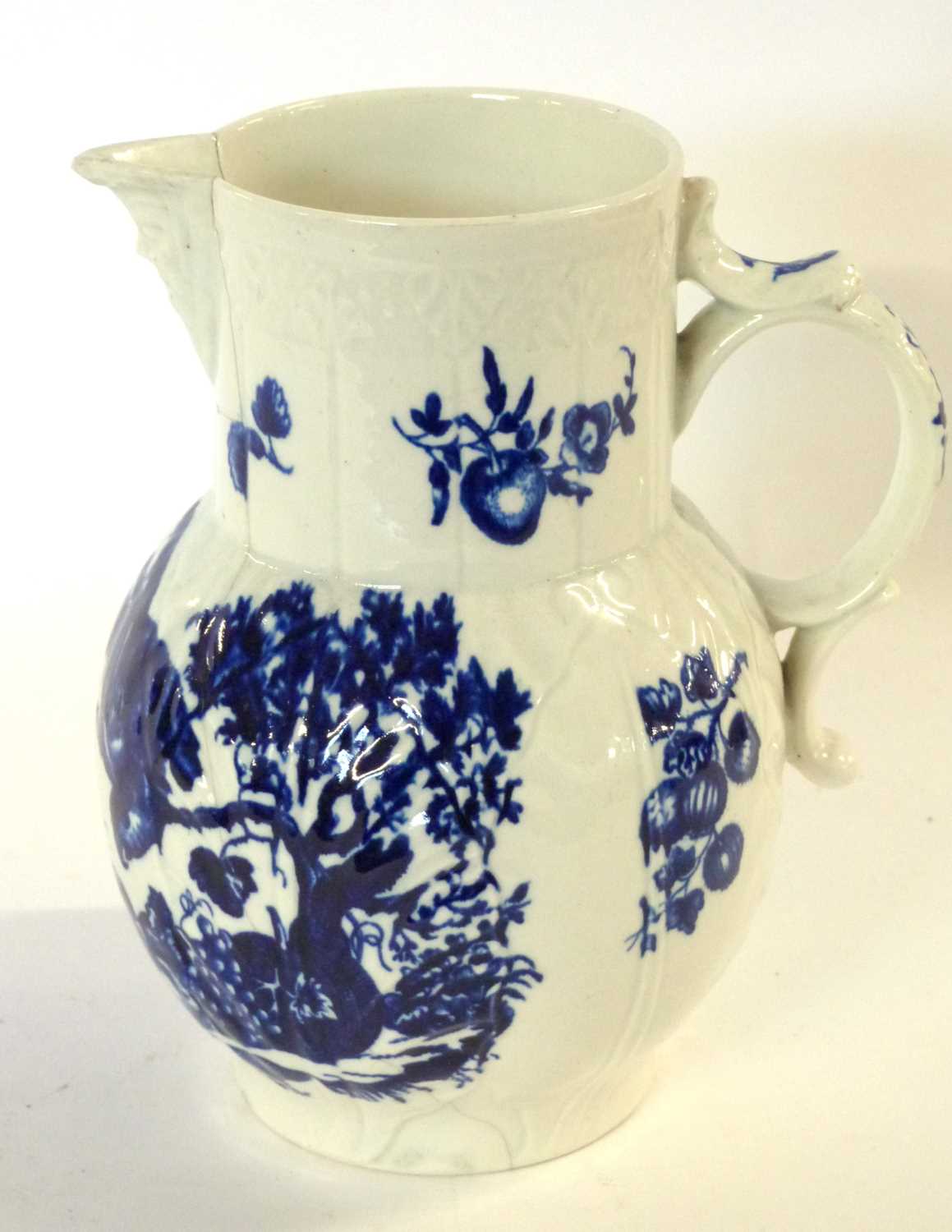 A Worcester porcelain mask jug decorated with prints of the parrot pecking fruit, 17cm high ( - Image 4 of 6