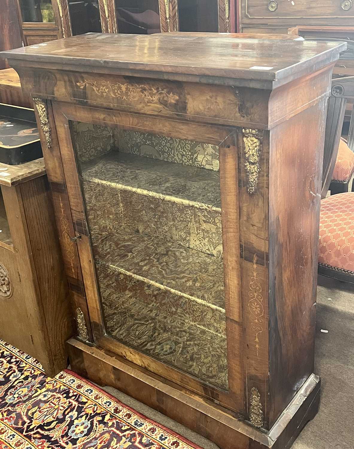 A Victorian walnut veneered pier cabinet of typical form with single glazed door and platform - Image 2 of 3