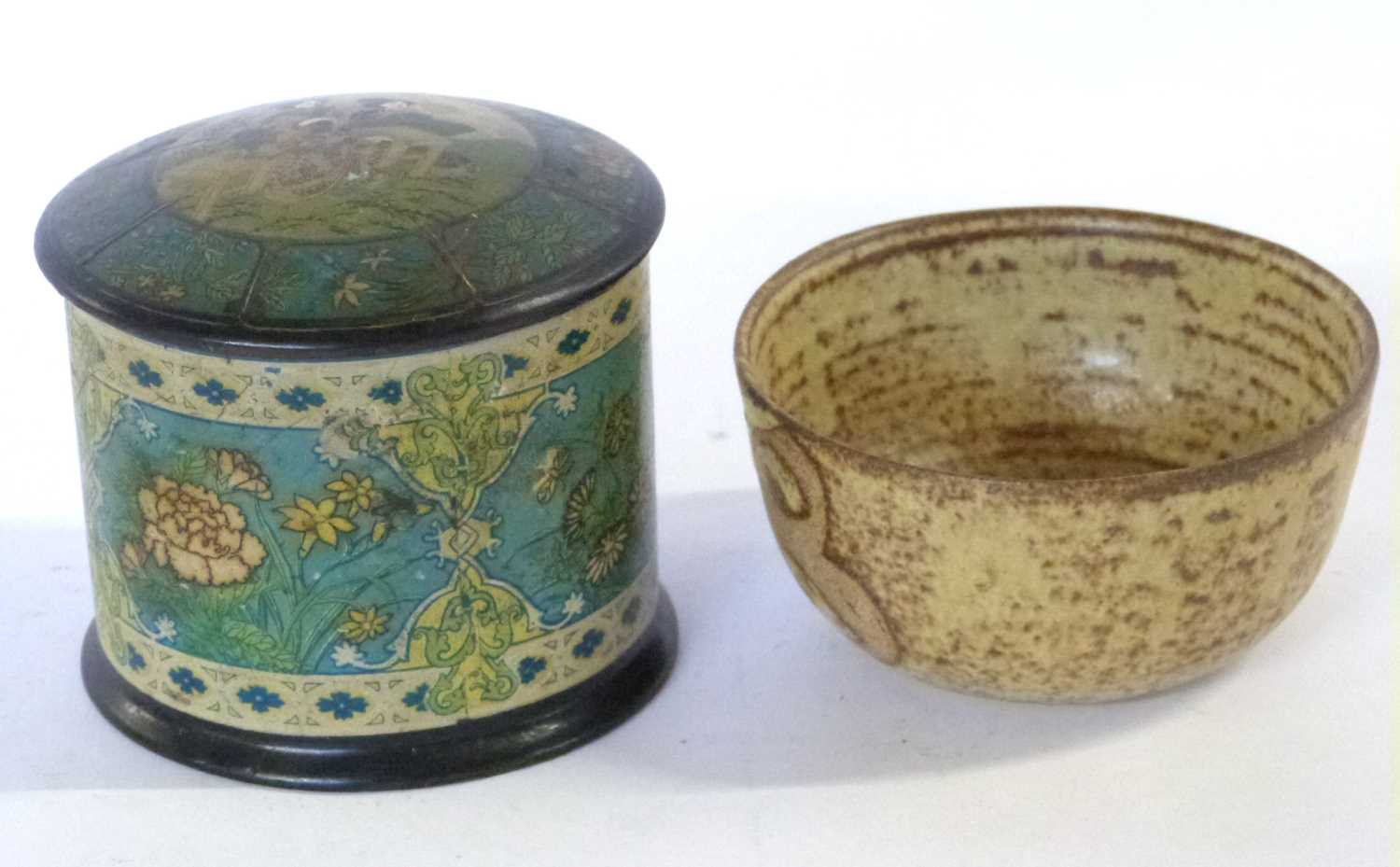 A small Studio Pottery bowl and lacquered tin with printed design