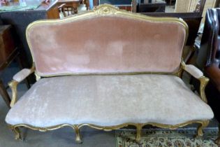19th Century gilt wood framed sofa with arched back, open arms and serpentine front, upholstered