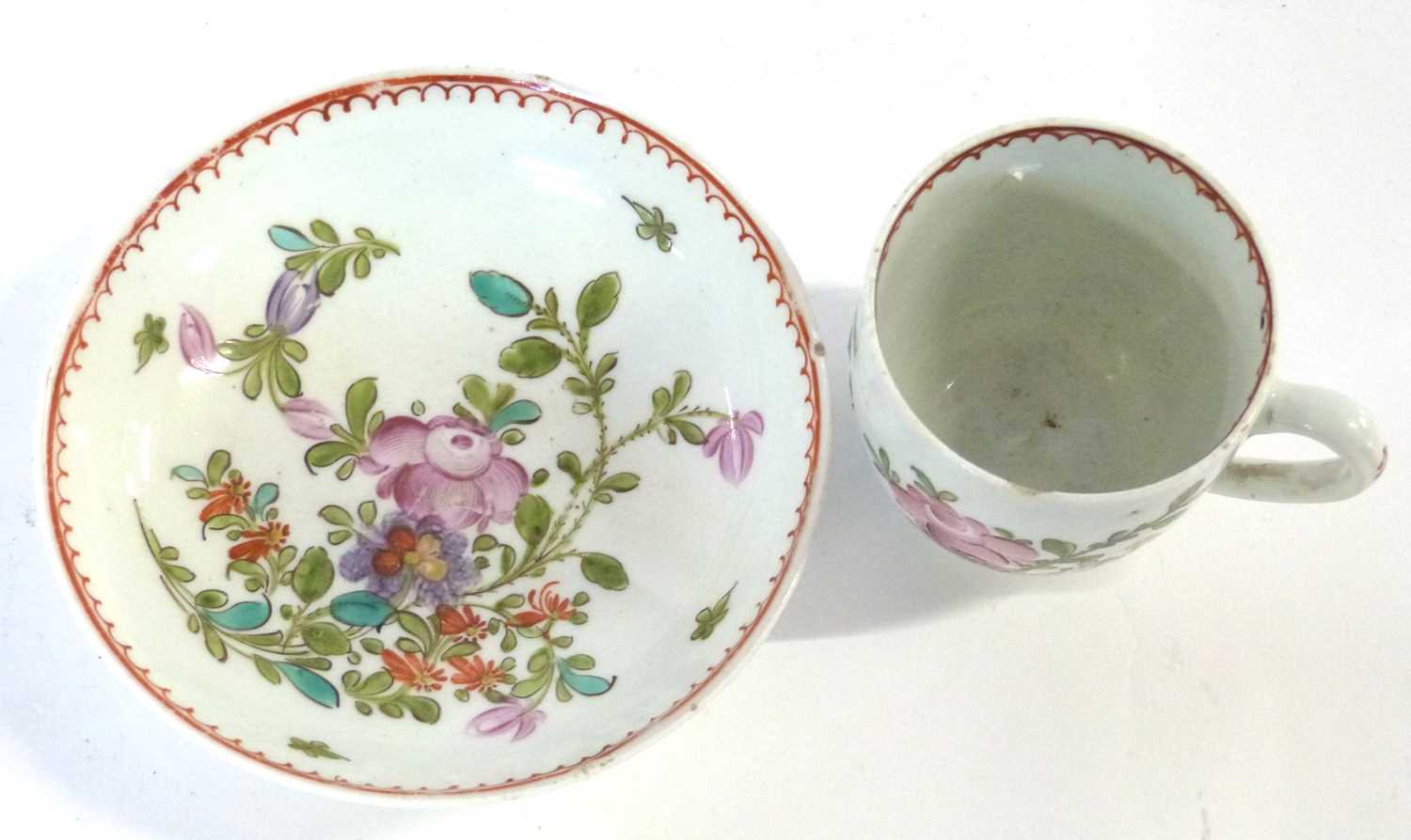 An 18th Century lustre porcelain cup and saucer decorated in Curtis style with flowers (chip to - Image 2 of 4