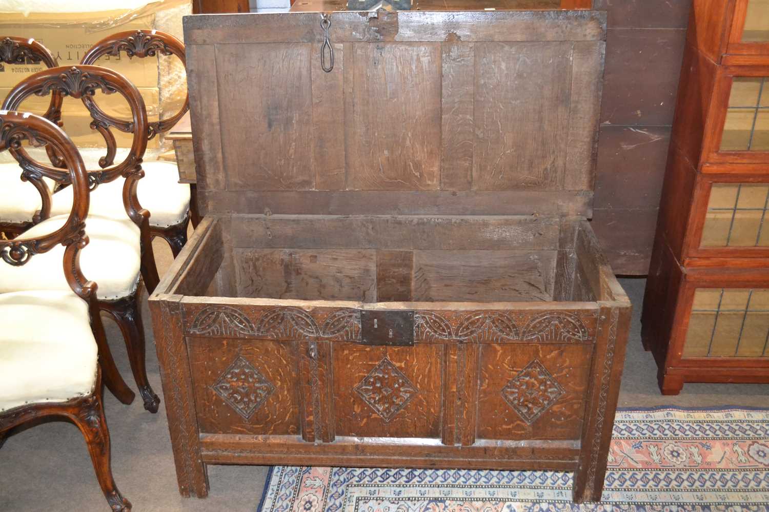 18th Century oak coffer with panelled top, hinged lid and carved decoration to the front, 109cm - Image 2 of 2