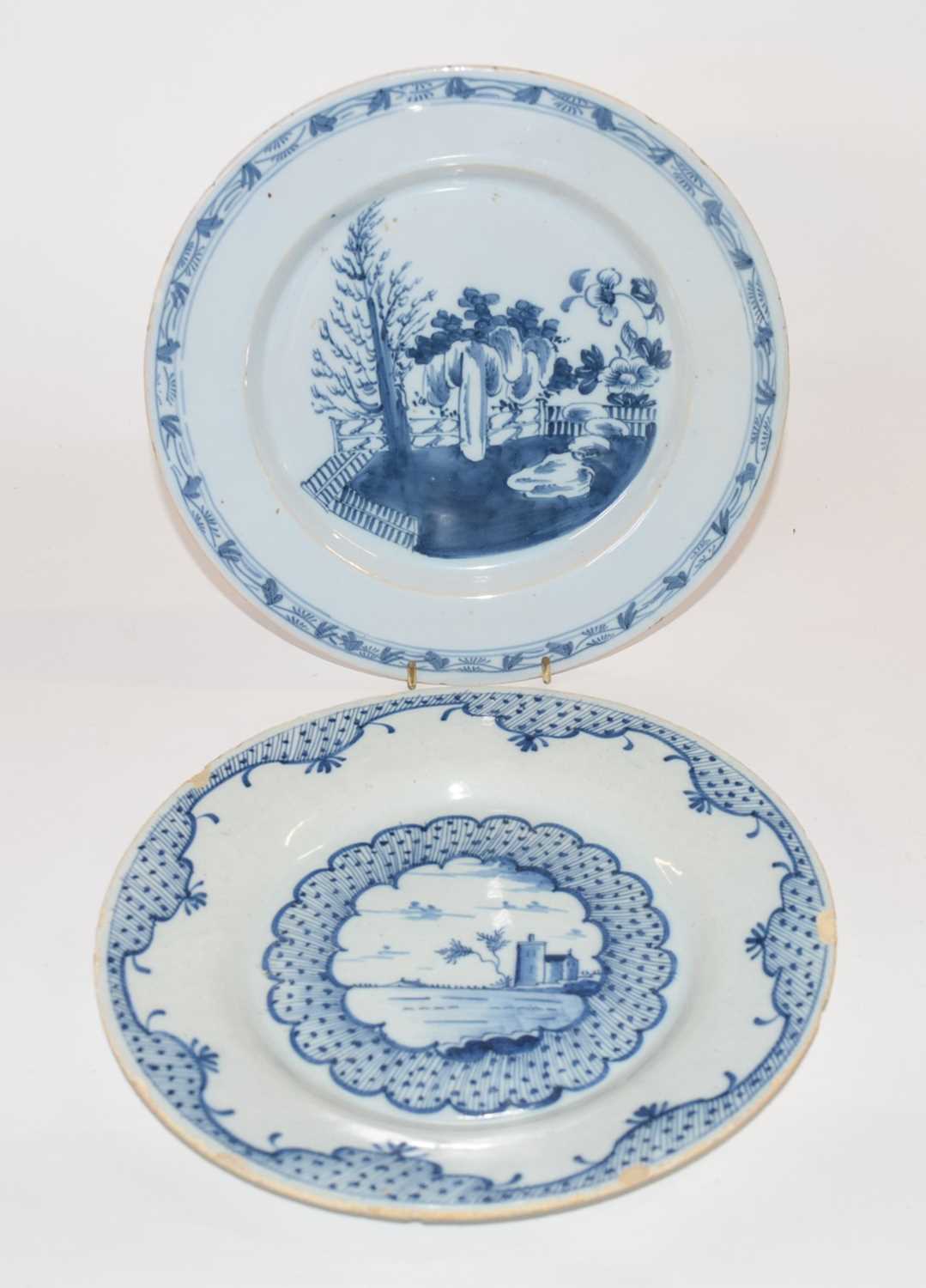 Two 18th Century English Delft plates, possibly Bristol, one with chinoiserie design together with a