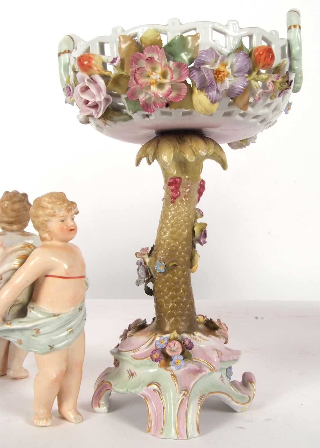 A continental porcelain centre piece modelled as a pierced basket with floral decoration on a tree - Image 5 of 9