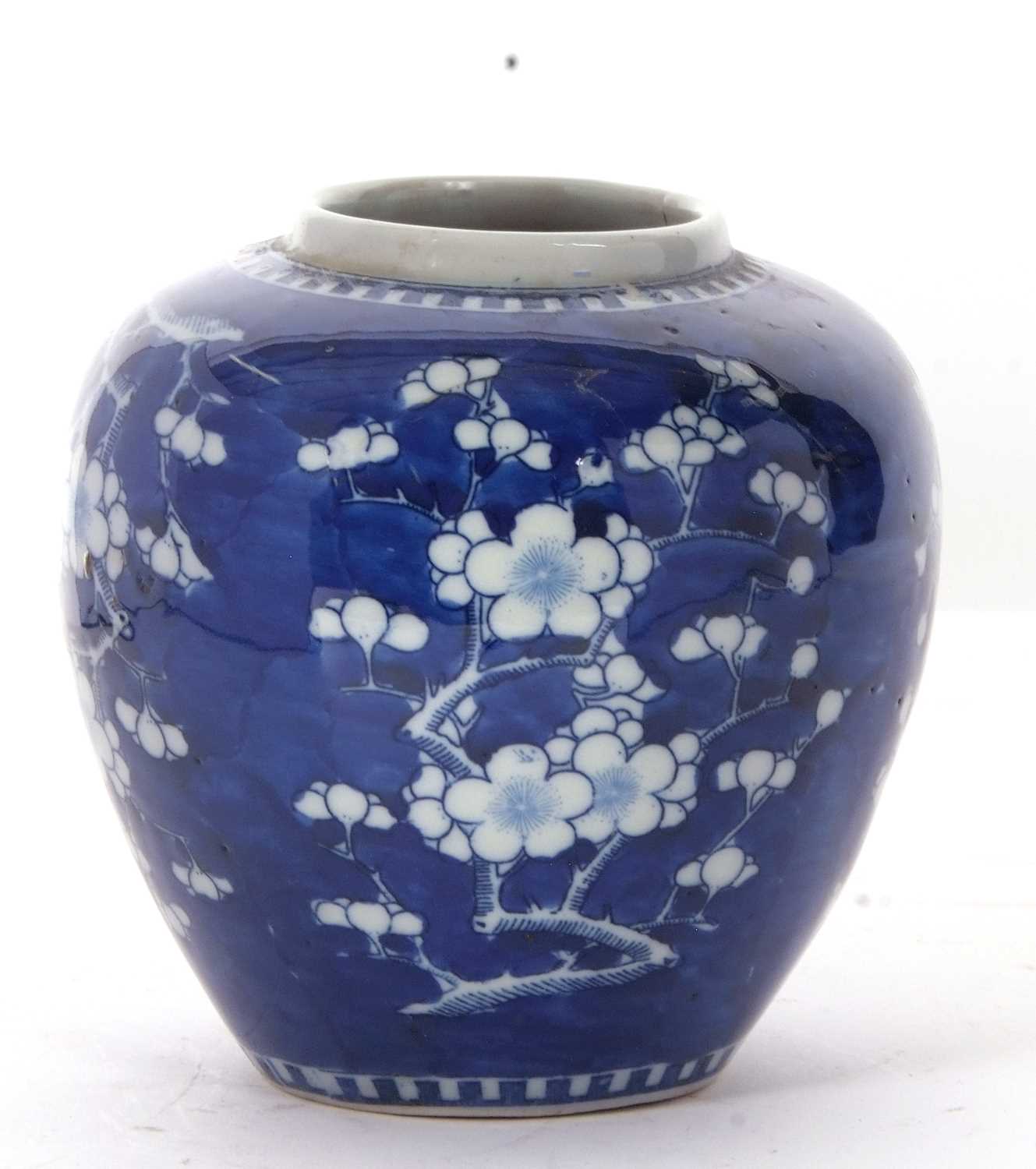 A Chinese porcelain ginger jar 19th Century, the blue ground with prunus decoration, four - Image 2 of 11