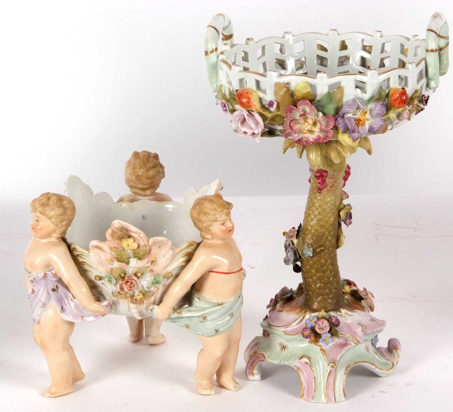 A continental porcelain centre piece modelled as a pierced basket with floral decoration on a tree - Image 3 of 9