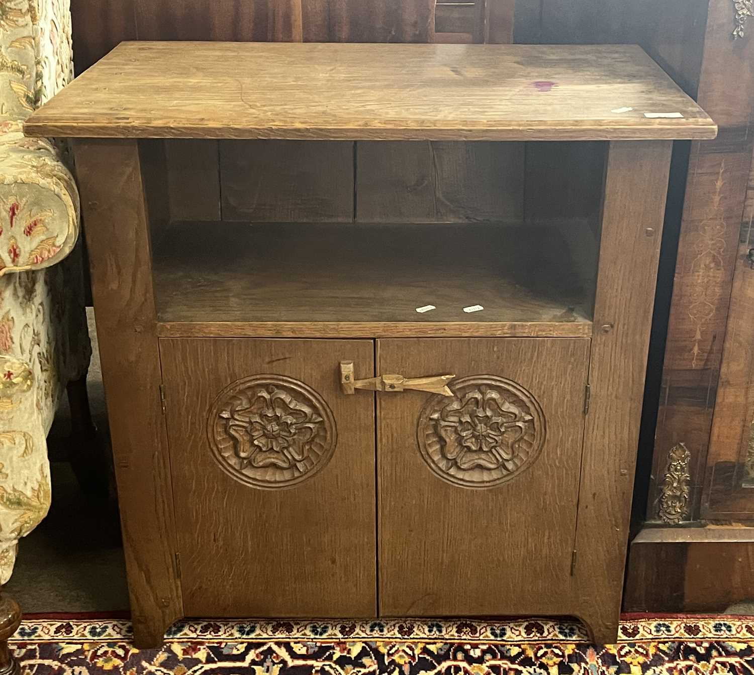 Jack Grimble of Ingworth - Oak side cabinet with two doors carved with Tudor rose detail, signed