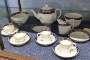 A late 18th Century Worcester part tea set or possibly Caughley comprising teapot, milk jug,