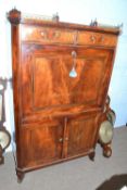 Early 19th Century French mahogany and brass inlaid secretaire cabinet with two drawers over a
