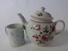 An 18th Century Bow porcelain teapot with polychrome floral design together with an early Bow