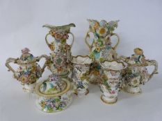 Quantity of 19th Century floral encrusted porcelain in Minton or Colbrook style including two vases,