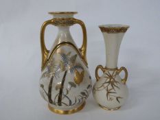 Royal Worcester vase with pierced neck, decorated in Japanesque style with bamboo and butterflies