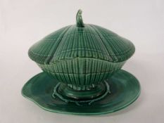 A Wedgwood green glazed 20th Century sauce tureen and cover, the tureen modelled as a shell and a