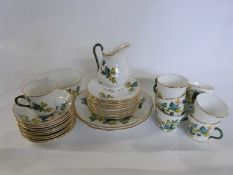 Part 19th Century English porcelain tea set with a printed ivy design comprising cups, saucers, side