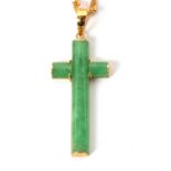 A jade cross and chain stamped 916k, the 32mm long jade cross with closed back of unmarked yellow