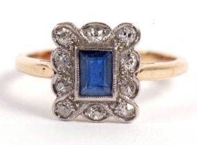 A sapphire and diamond ring, the central rectangular sapphie surrounded by small single cut