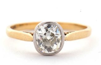 An 18ct single stone diamond ring, the oval old mine cut diamond, estimated approx. 0.90cts, in a