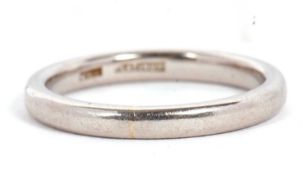 A plain wedding band, 2.8mm wide, stamped 'Platinum', size P, 6.3g