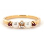 A ruby, diamond and cultured pearl ring, with two small round diamonds to centre, with a cultured