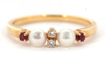 A ruby, diamond and cultured pearl ring, with two small round diamonds to centre, with a cultured