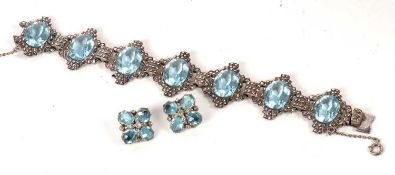 An early/mid 20th century blue paste and marcasite bracelet and earrings, the bracelet set with oval