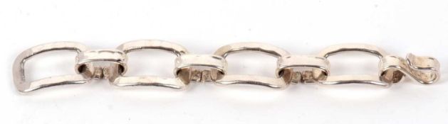 A Danish silver plated bracelet by Jacob Hull, the beaten rectangular links with S-shape clasp,