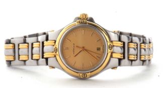 A lady's Gucci wristwatch, the named gilt dial with baton numerals, calendar function, with gilt and