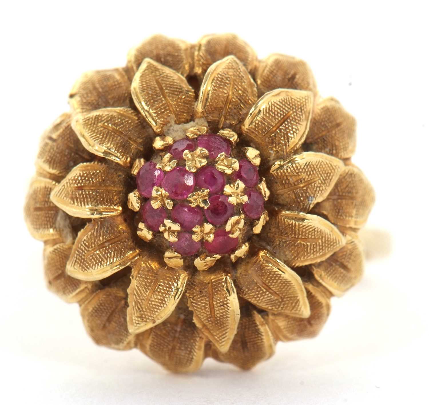 A 1960's 18ct and ruby flower ring, set to centre with small round rubies and surrounded by - Image 2 of 7