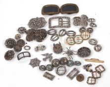A mixed lot of buckles and buttons, to include cut steel, marcasite and paste