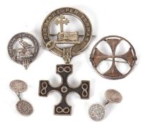 A quantity of Scottish silver brooches, to include a clan MacDonald crest and motto brooch,