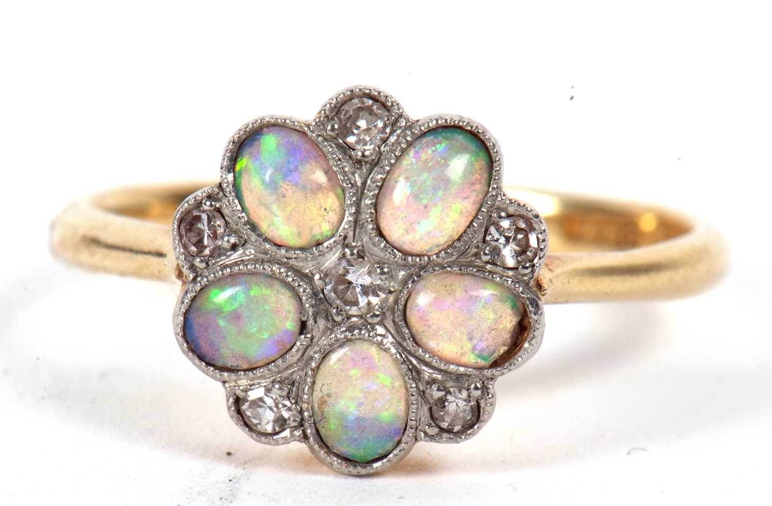 An 18ct and platinum opal and diamond ring, the flowerhead cluster with oval opal cabochon petals - Image 6 of 10