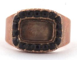 An early 19th century memorial ring, the rectangular keepsake panel (empty) surrounded by black