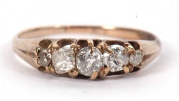 A five stone diamond ring, the five graudated old mine cut diamonds, total estimated approx. 0.