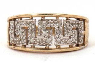 A 9ct and diamond Greek key style ring, the diamond set Greek key design, all set in white gold