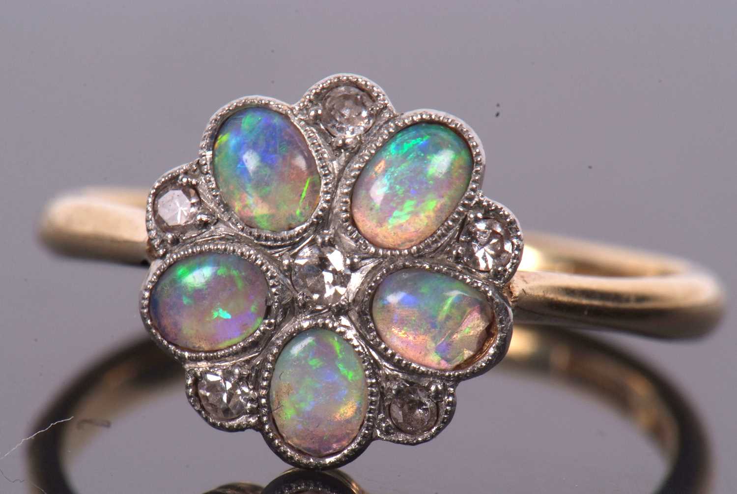 An 18ct and platinum opal and diamond ring, the flowerhead cluster with oval opal cabochon petals - Image 2 of 10