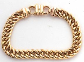 A bracelet by Unoaerre, the curblink bracelet with tapered ends, one end stamped 375 with Unoaerre