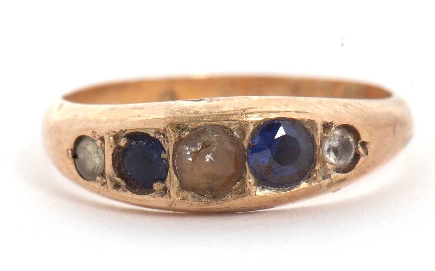 A 9ct sapphire and white stone ring, the alternating graduated sapphire and white stones in - Image 2 of 6