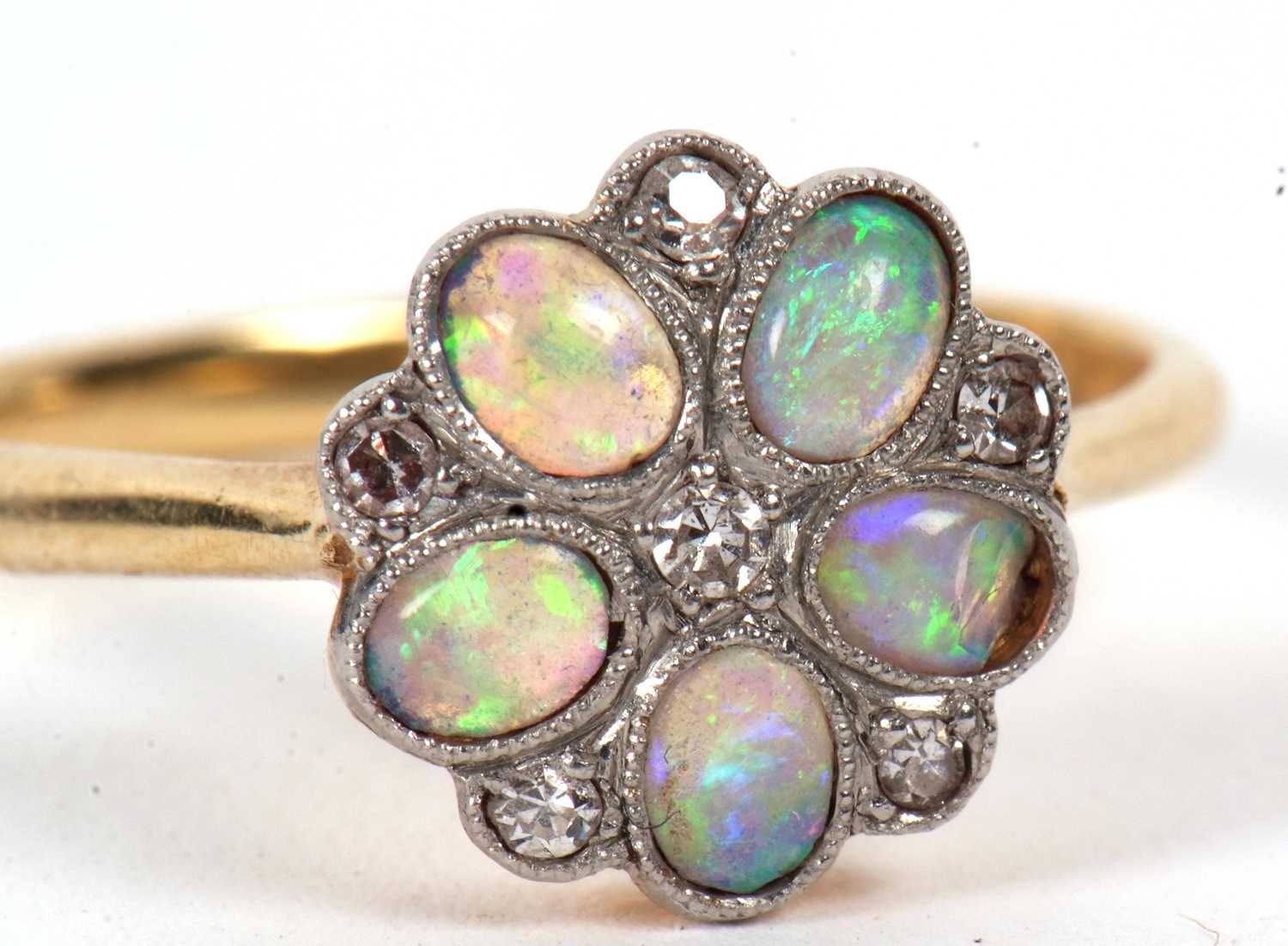 An 18ct and platinum opal and diamond ring, the flowerhead cluster with oval opal cabochon petals - Image 7 of 10