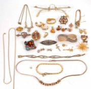 A quantity of mixed costume jewellery, to include foil backed topaz, silver heart shape brooch,