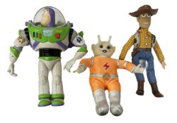 A mixed lot of Toy Story figures, to include Buzz, Woody and an unrelated glowing Alien by Dolls