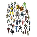 A collection of 1980s/1990s popular culture action figures from various franchises to include: - X-